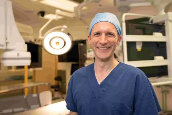 Associate Professor Dominik Linz in scrubs