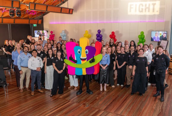 The Hospital Research Foundation Group staff with mascot captain cure